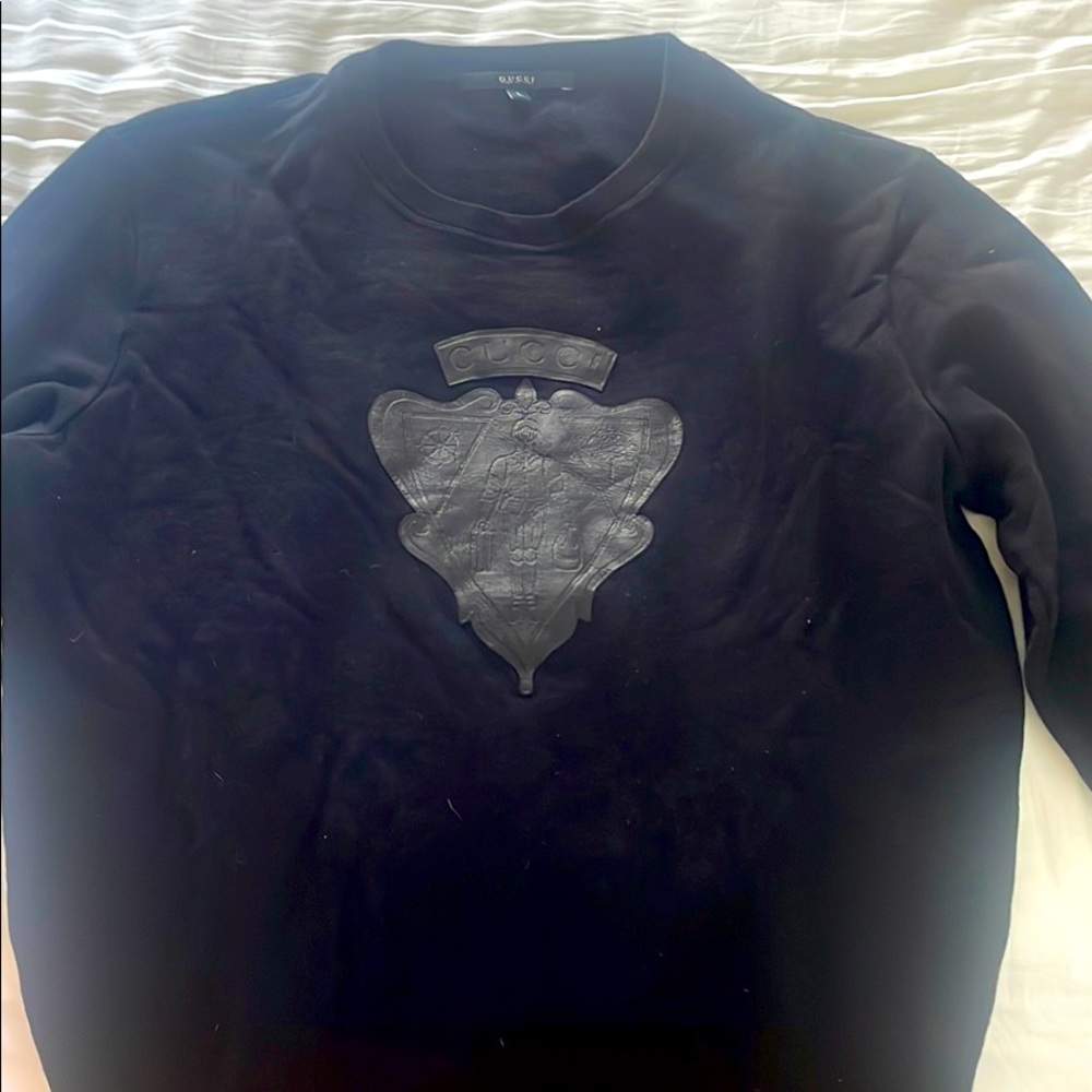 Gucci women’s sweater.